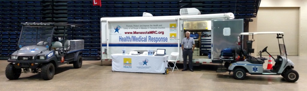 Display showing the MRC van and vehicles used during an emergency deployment